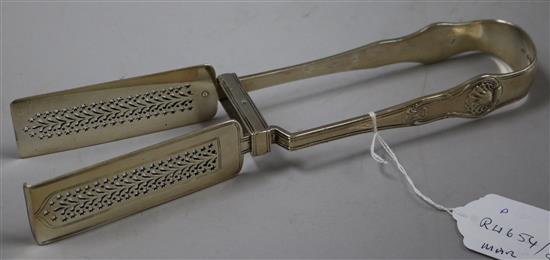 A pair of George IV silver hourglass pattern asparagus servers, by William King, London, 1824, 9.5 oz.